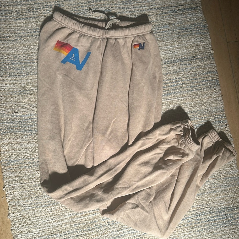 Tan Aviator Nation sweats with AV logo